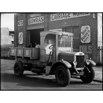 012756PD: Truck with tray tipped, 1920s