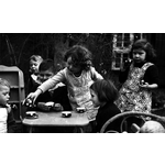 005187D: Preschool children having a tea party outside