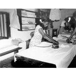 006952D: Girl ironing, 1953