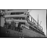 111945PD: Alongside, passengers on deck, 1924?