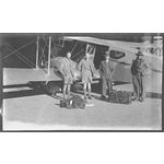 217208PD: Passengers in front of a De Havilland DH.84 Dragon II of MacRobertson Miller Aviation Co, 1936