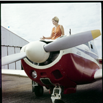 216118PD: Robin Miller, the Sugarbird Lady, with her Mooney Super 21 aircraft VH-REM, ca. 1968-1972
