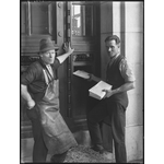 013563PD: Posting the mail in letterbox, 1930?