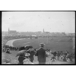 230741PD: View of a crowd and the field at Fremantle Oval, and surrounding buildings, ca. 1895