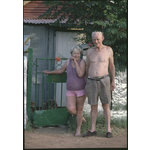 146408PD: Mick and Mona Braddock at the front gate of their home, 18 Hainault Road, Boulder, 1991-1992