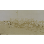 BA3510/51: Afghan cameleers and their camels loaded with water barrels at a water station, Goldfields, Western Australia, ca. 1900.