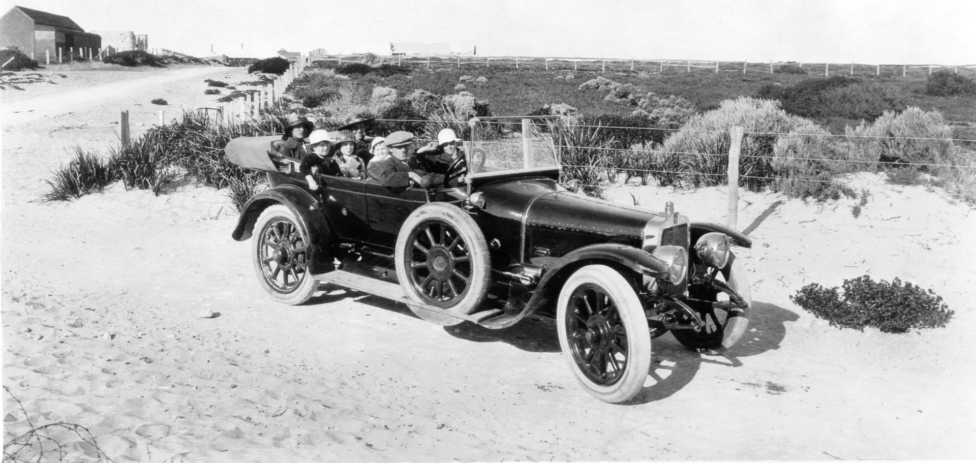 A family outing in an automobile, at North Beach, 24 April 1916