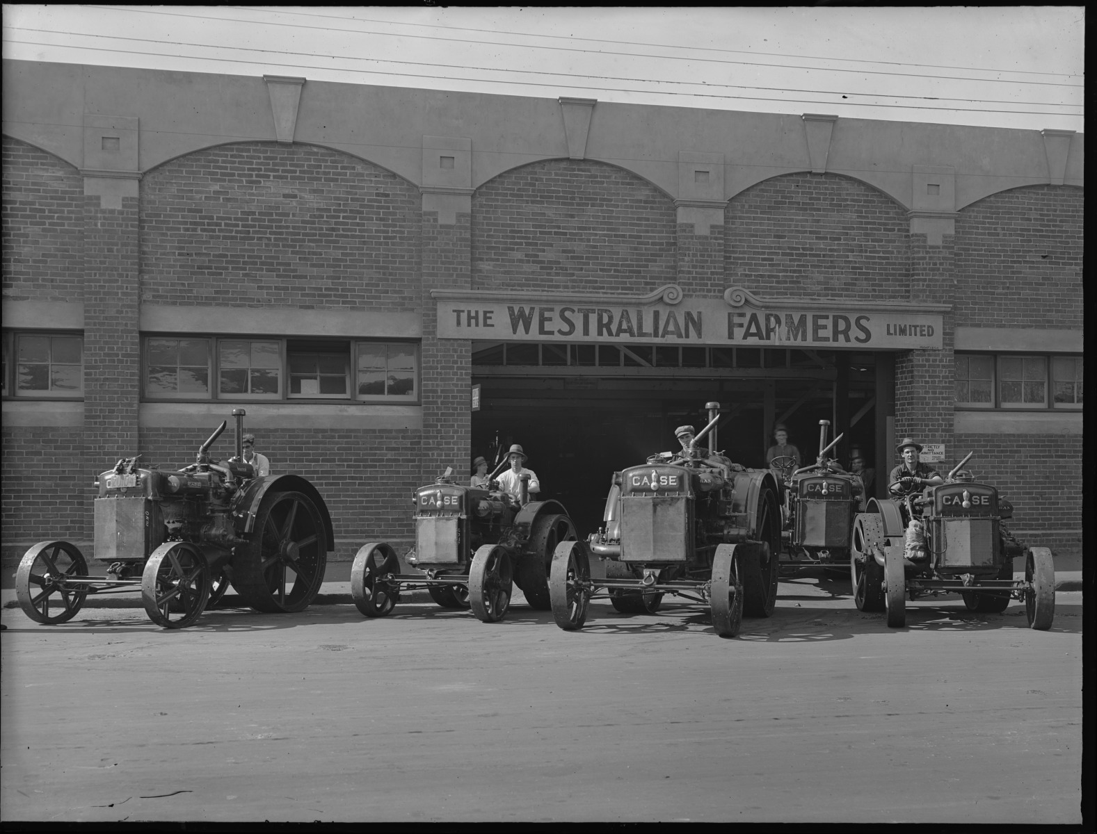 New case tractors outside Westralian Farmers building in James Street