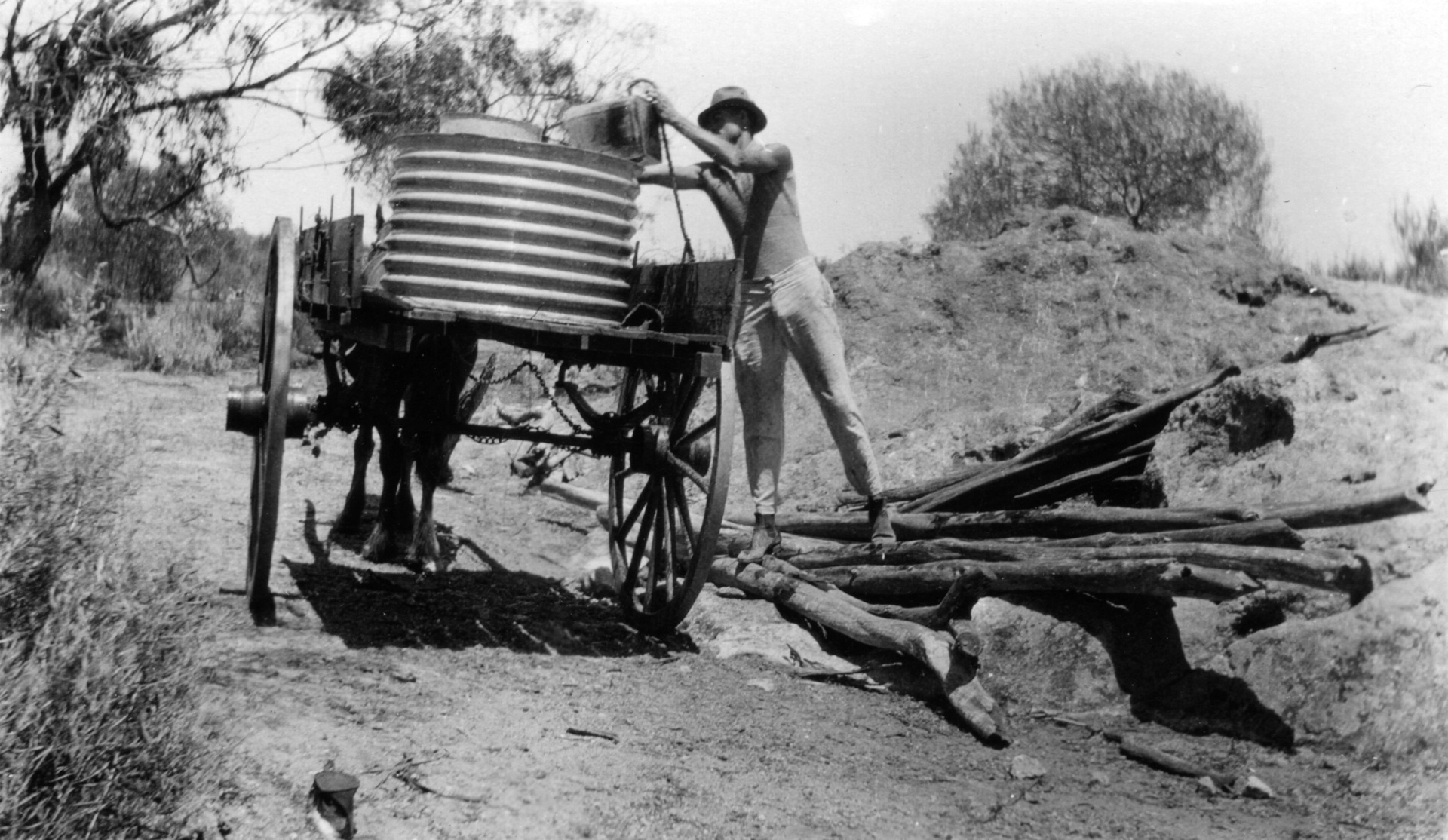 Loading a water cart at Caron [picture] State Library of Western