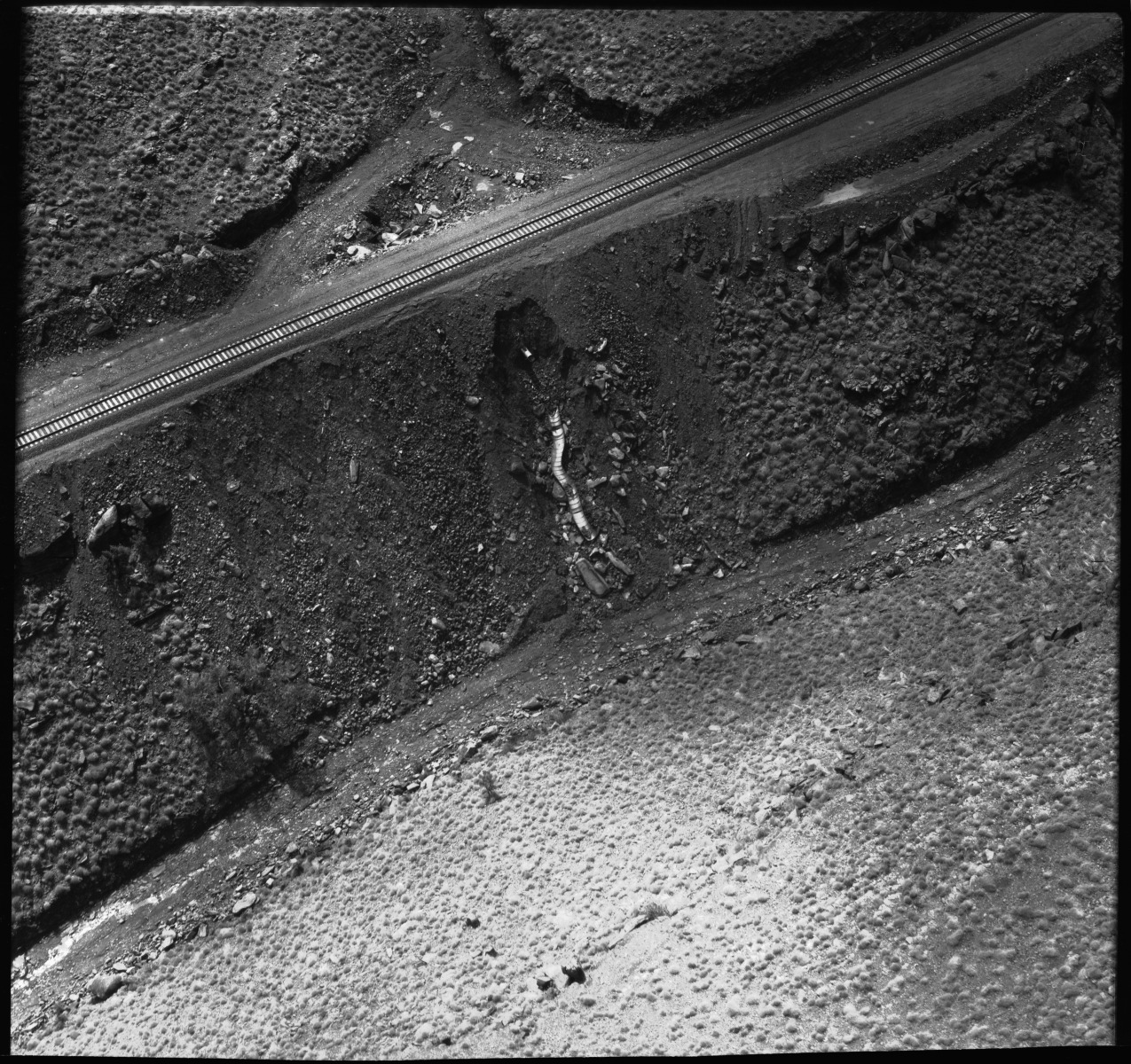 Aerial photographs of damage caused to the construction of Iron mining