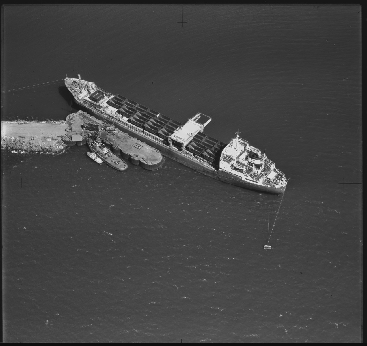Aerial photograph of the arrival of new ore rail trucks for the Dampier