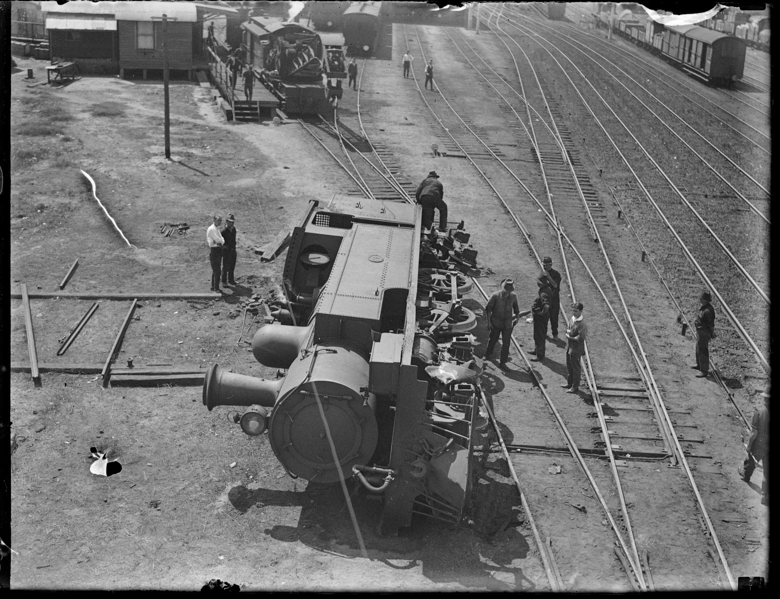 Over she went, a rough locomotive hit her broadside on as she came out ...