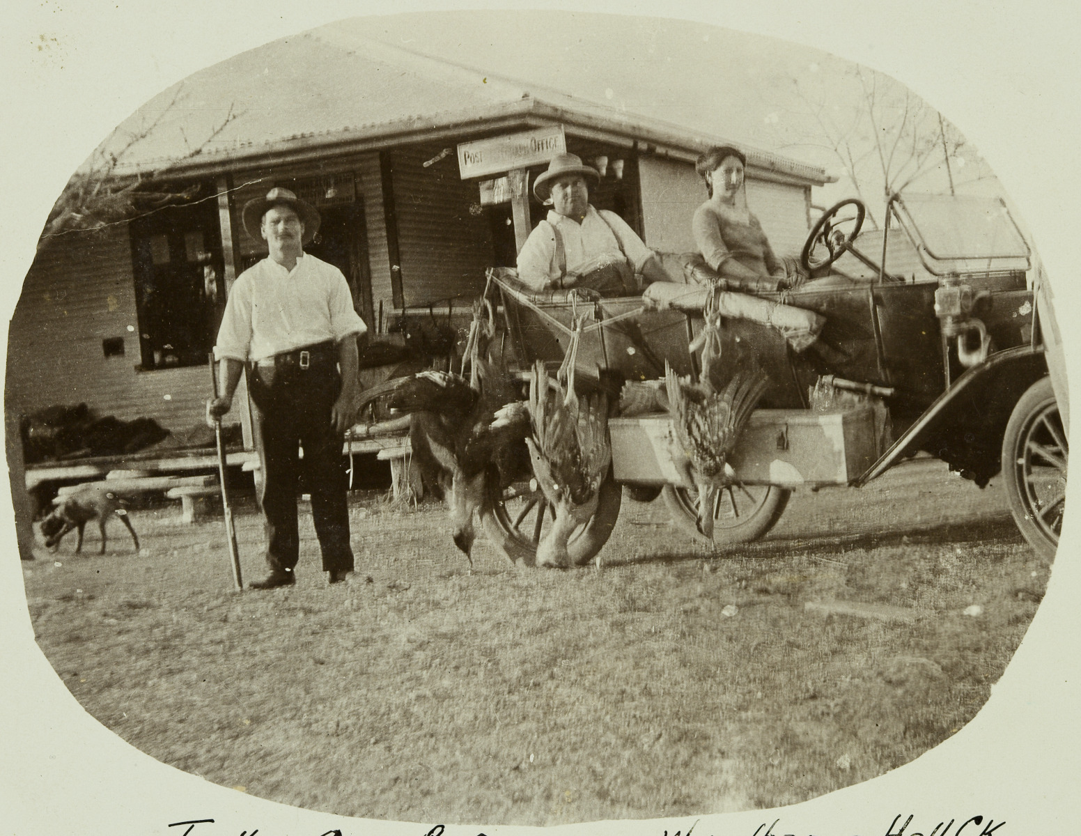 Sydney Yeo standing in front of the Turkey Creek Post Office JPG 583.2 KB