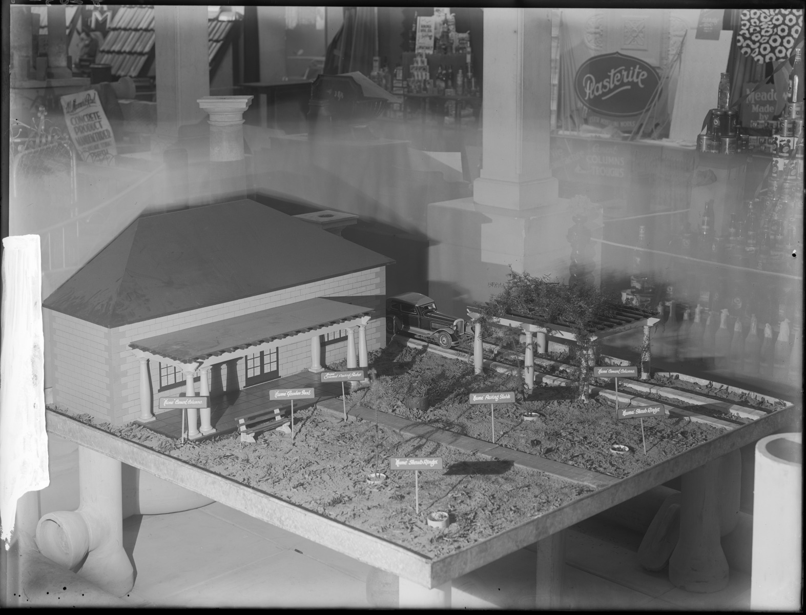 Model of a house with Hume Pipe Company products - State Library of ...