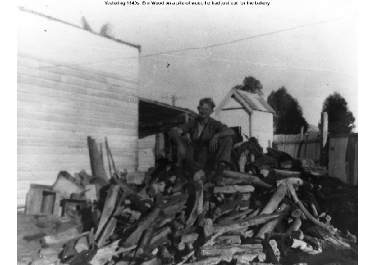 YP31: Ern Wood on a pile of wood he had just cut for the bakery, 1940s