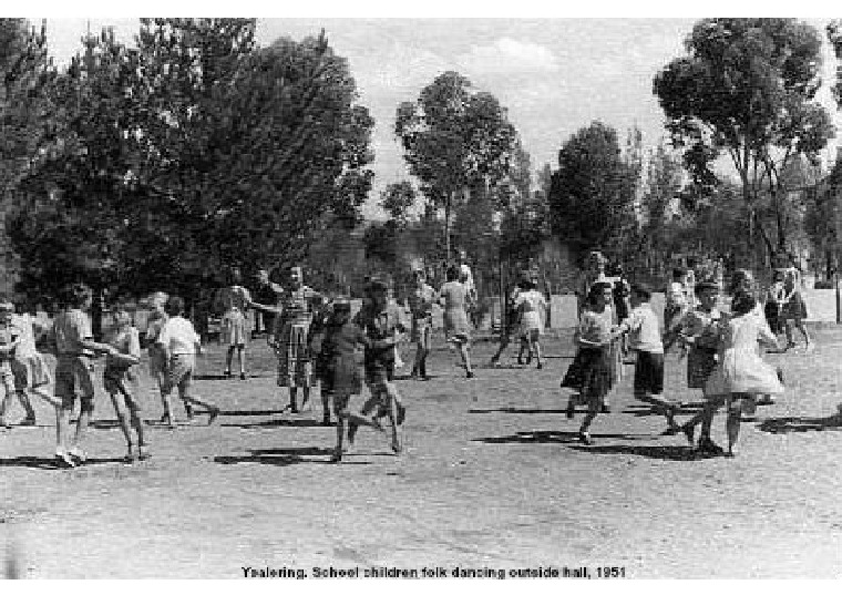 YS11: Yealering. School children folk dancing outside hall, 1951