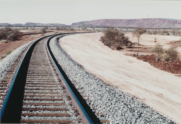 A newly constructed embankment on the DampierTom Price Railway, May 1968. State Library of