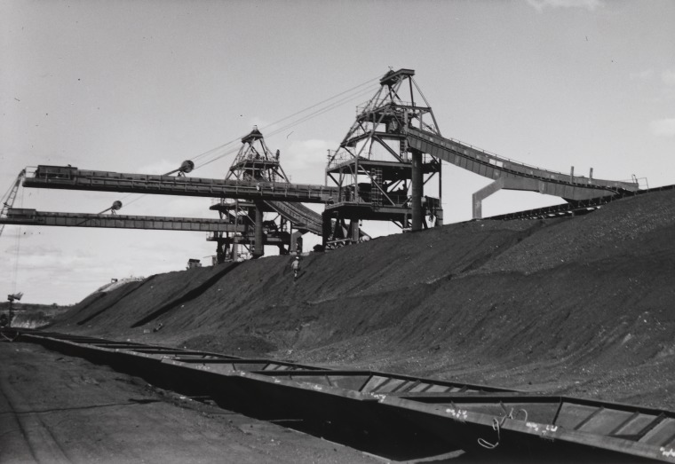 Mine stackers rising from the bench above the rail load out tunnel at ...