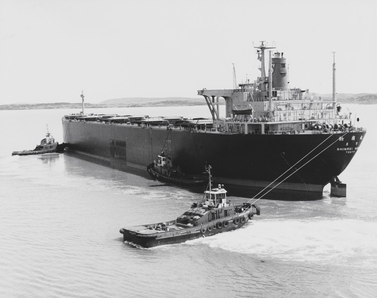 The Bulk Ore Carrier Shinrei Maru Is Guided Into Port By Hamersley Iron ...