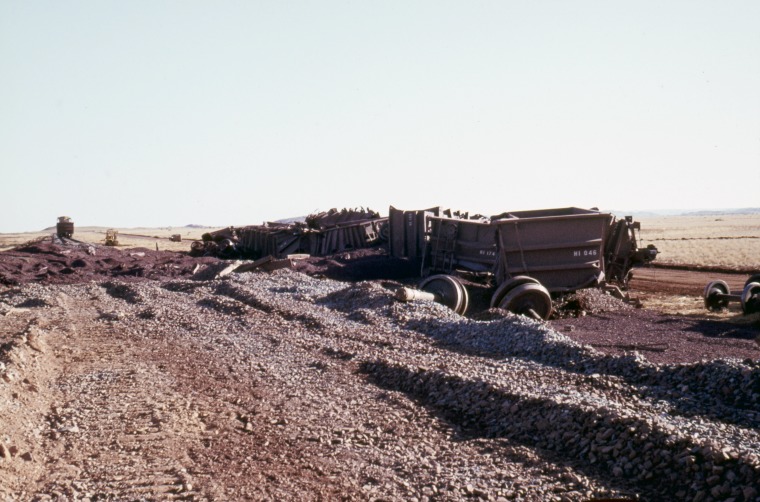 A train derailment on the DampierTom Price Railway after heavy rains. State Library of
