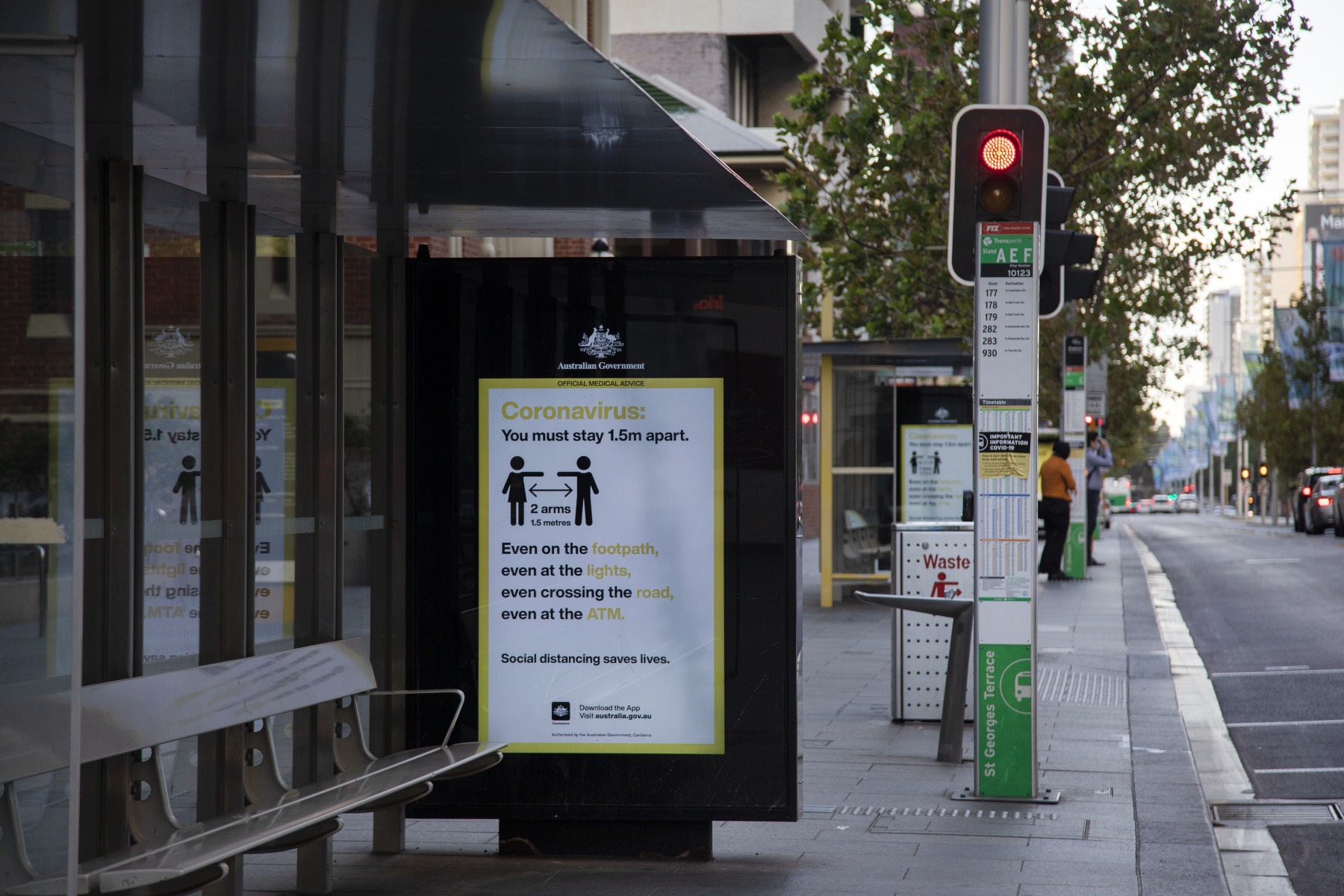 Social distancing rules sign on a bus stop in St Georges Terrace, Perth ...