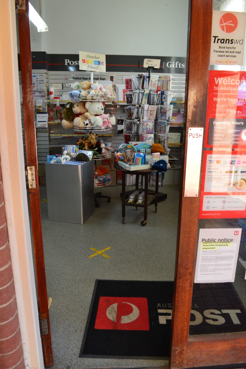 Social distancing in place and changes to postal services notice at the